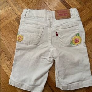 size 6 Levi's Cream Shorts with Floral Accents